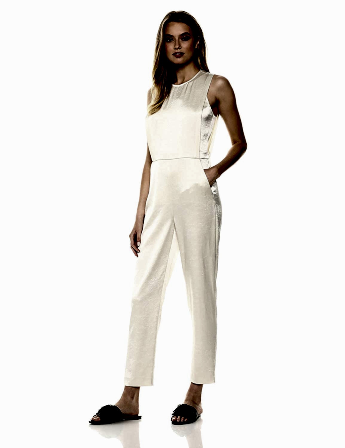A sophisticated jumpsuit with smooth panels that lend a layered look to the fitted bodice.