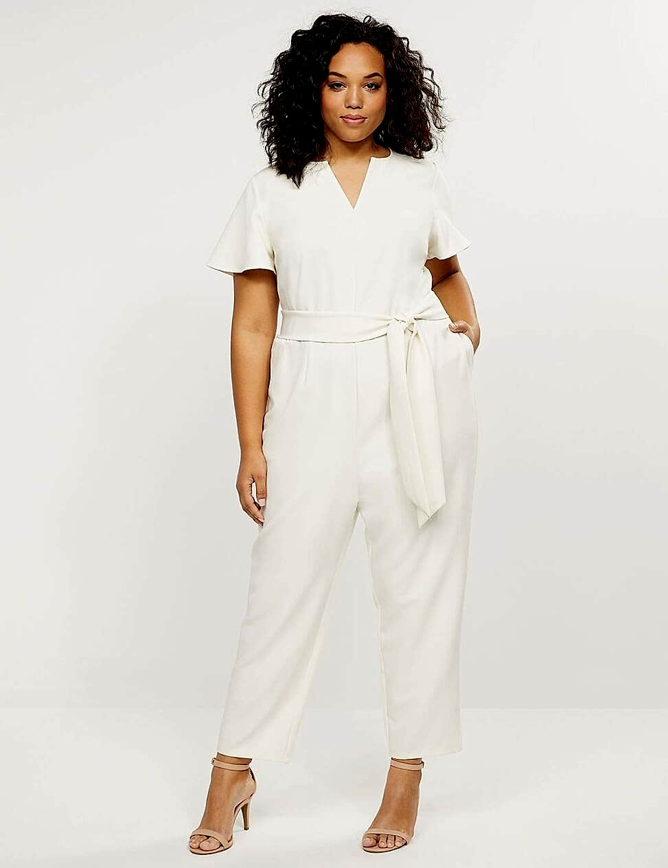 This no-fuss styles makes a major statement with flutter sleeves, pockets and style versatility.