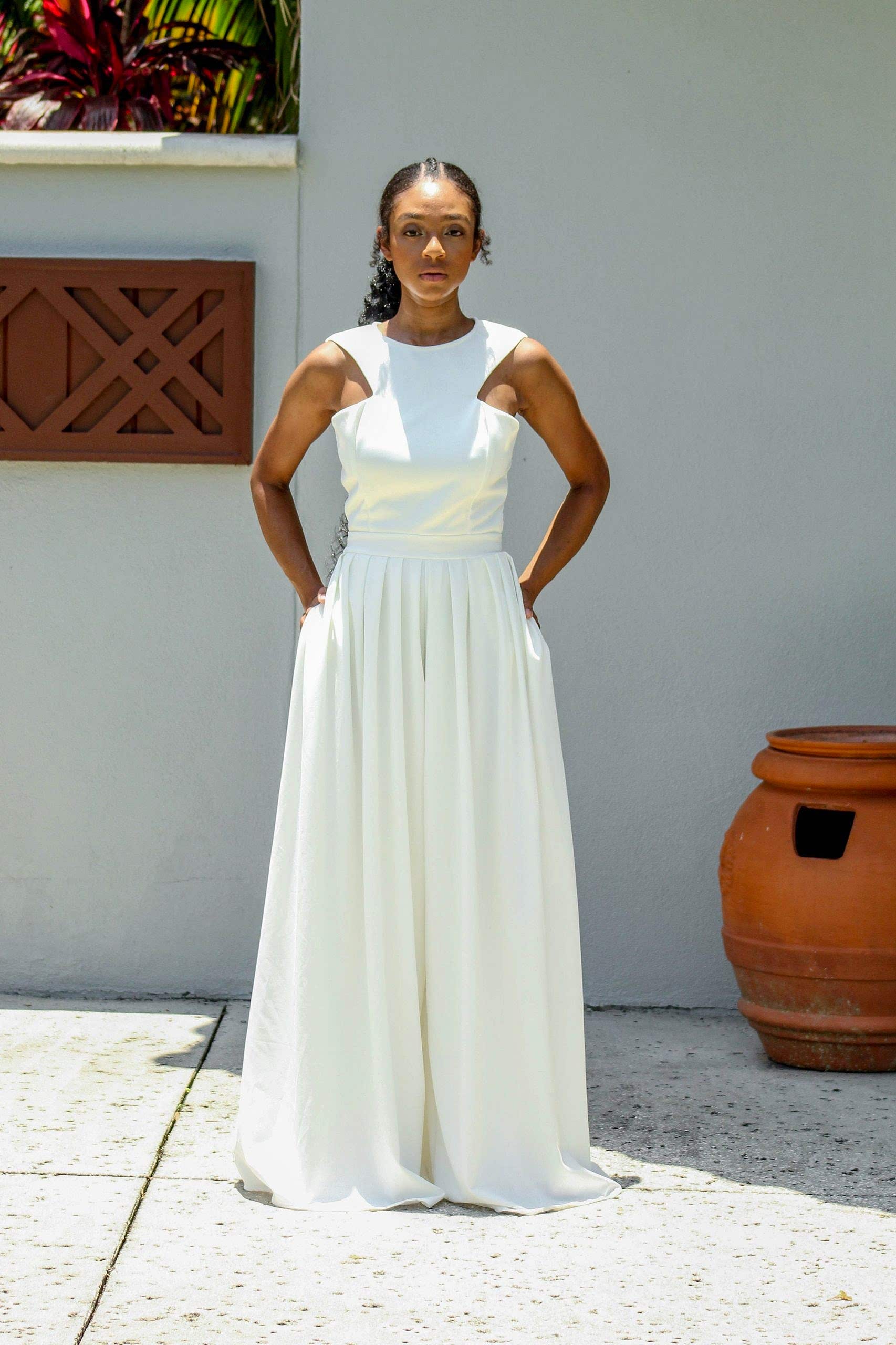 Easy to slip on and features side seam pockets and a hidden zipper finish in the back, show off like you want to.