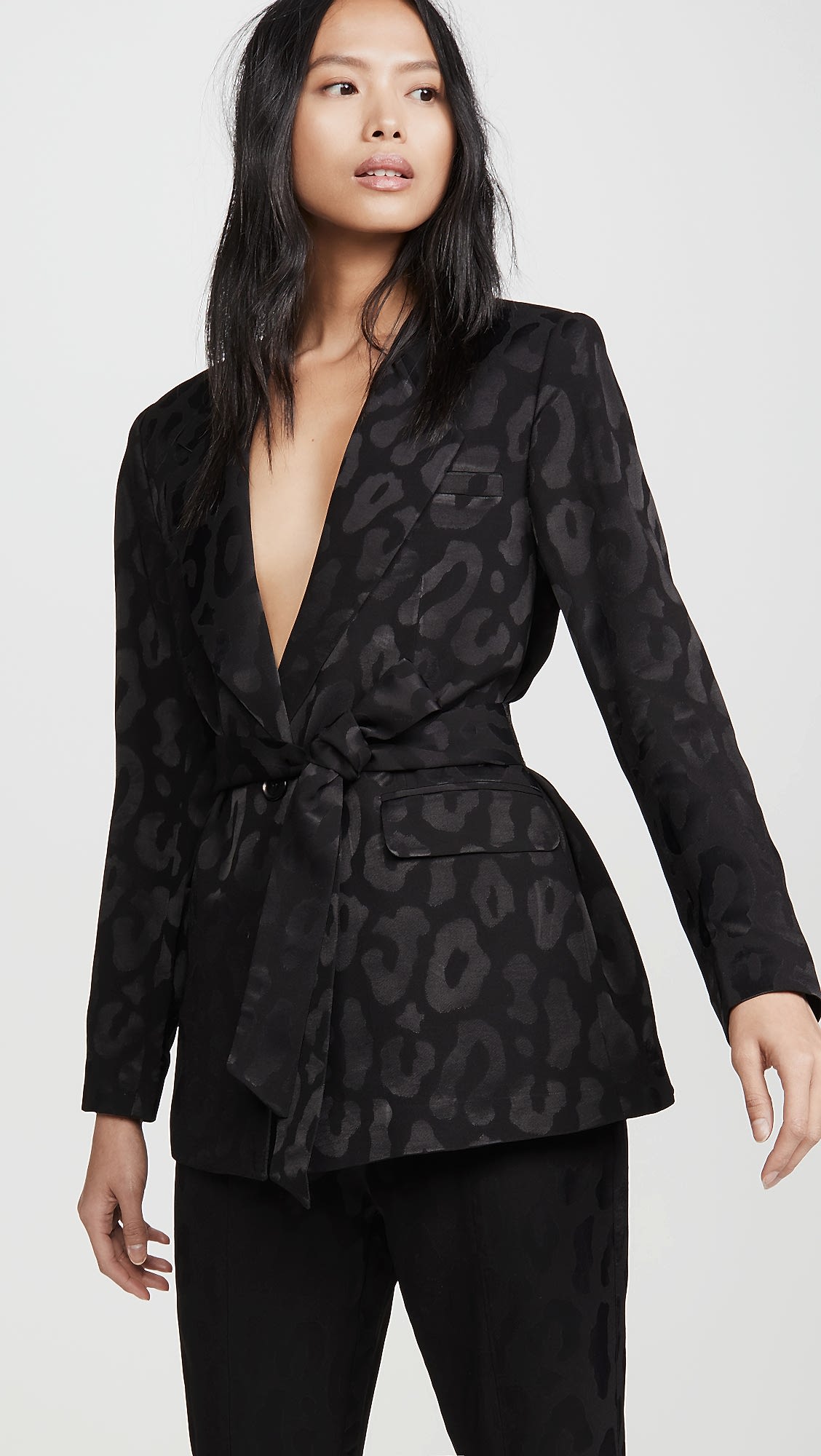 A black blazer and belt.