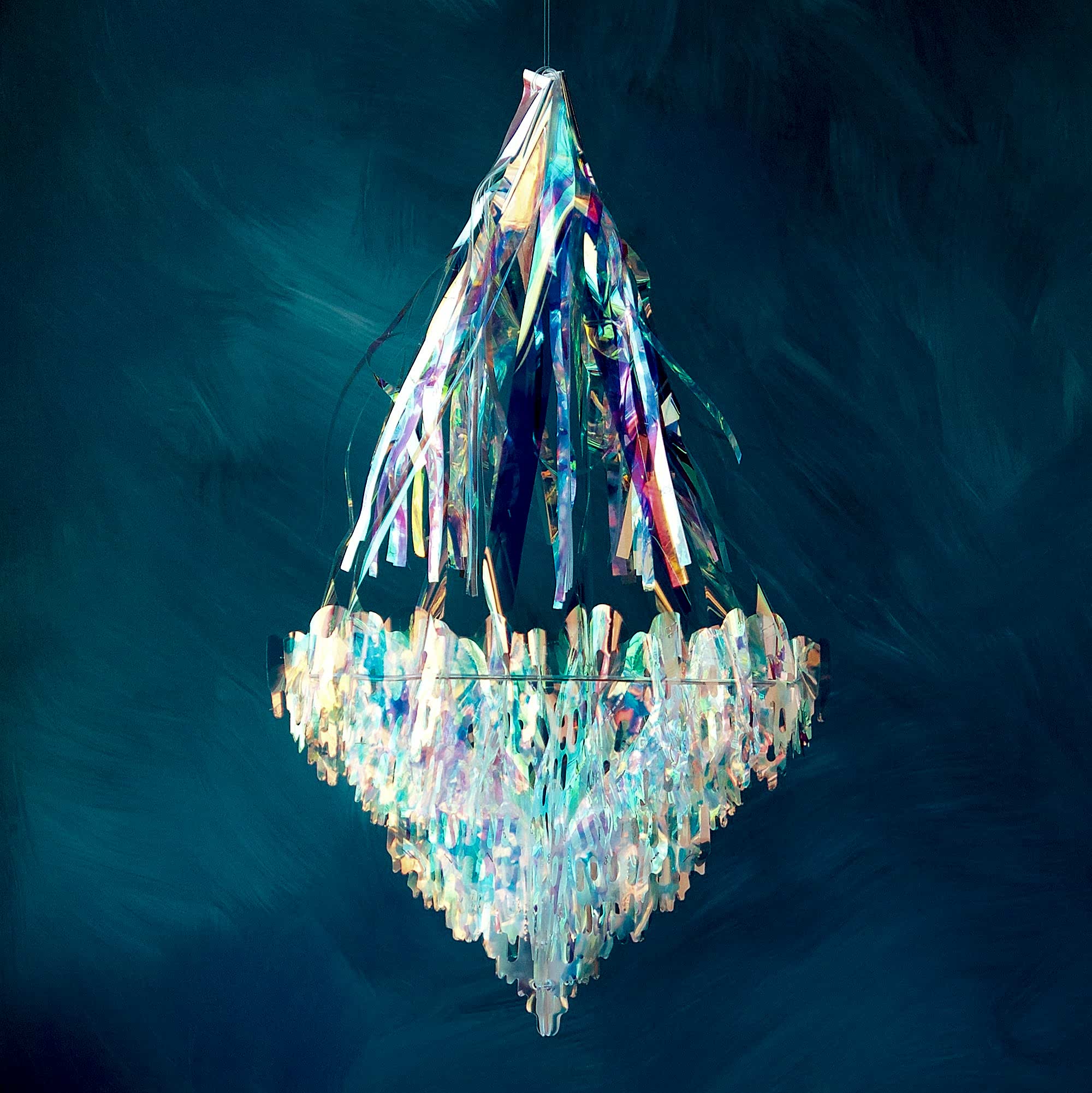 A chandelier made of iridescent streamers.