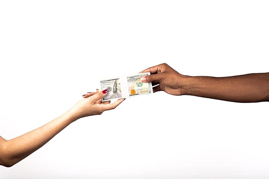 Money being handed off