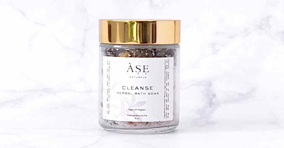 jar of bath salts on a marble background
