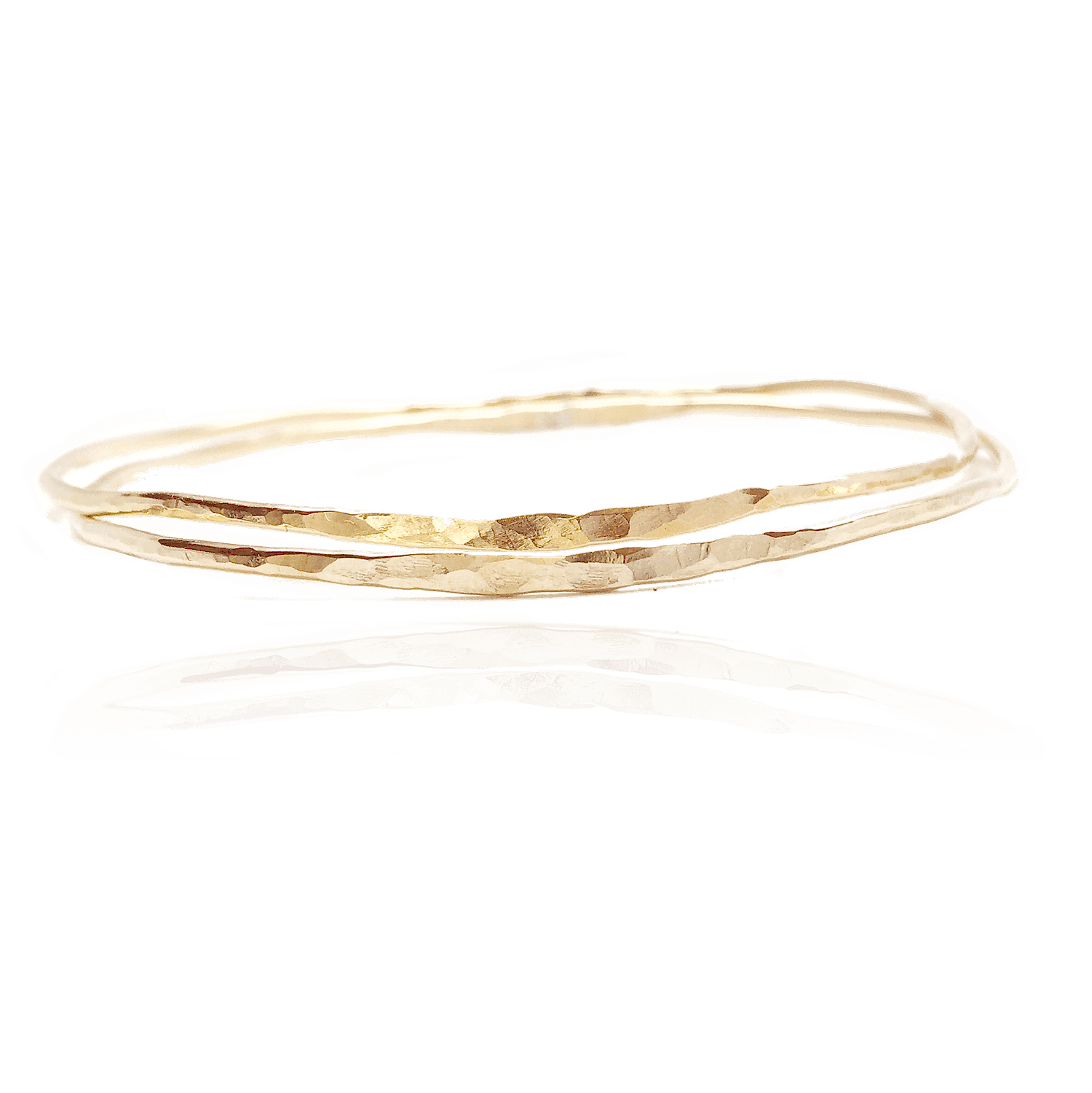 two hammered gold bangle bracelets