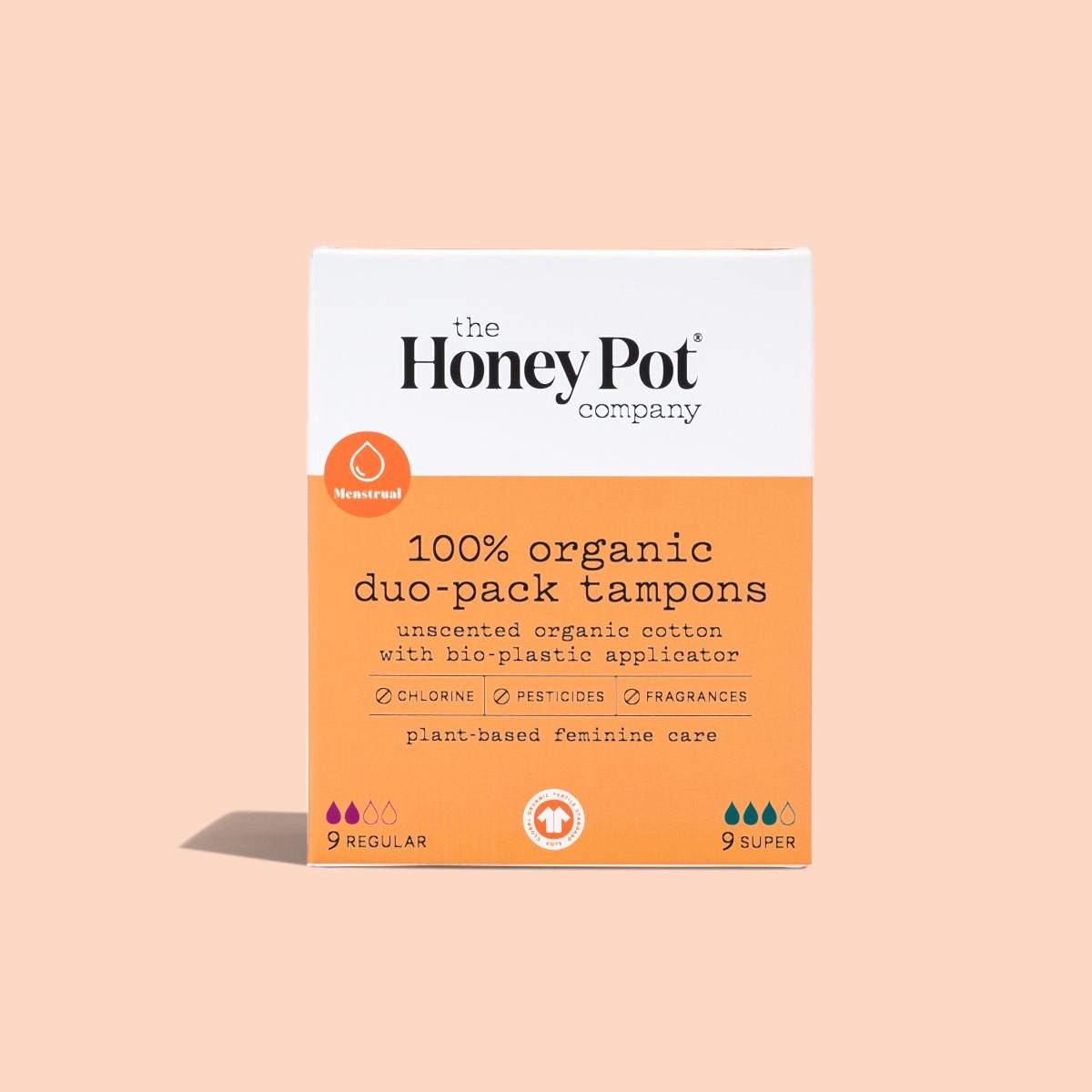 box of organic tampons on a beige background
