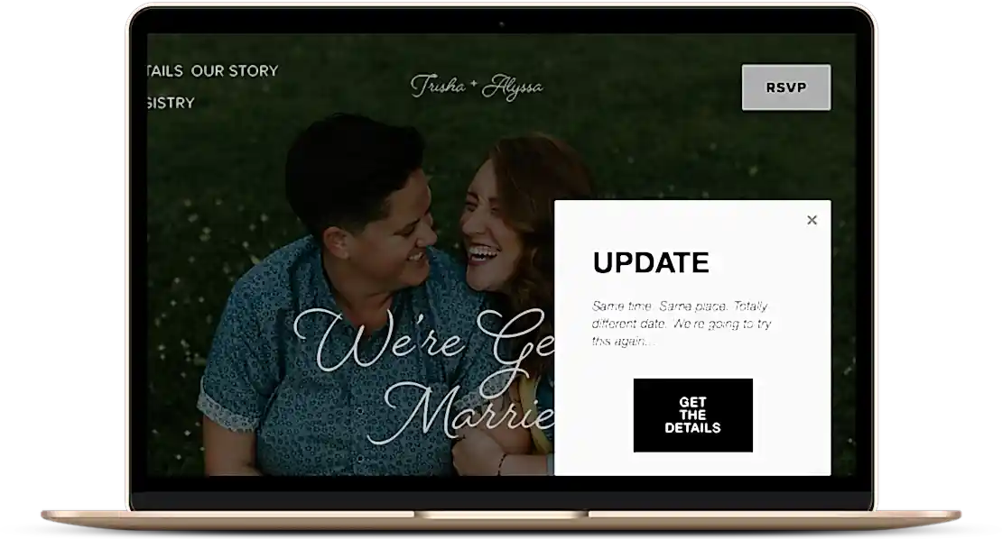 laptop showing wedding website with update pop up regarding date change