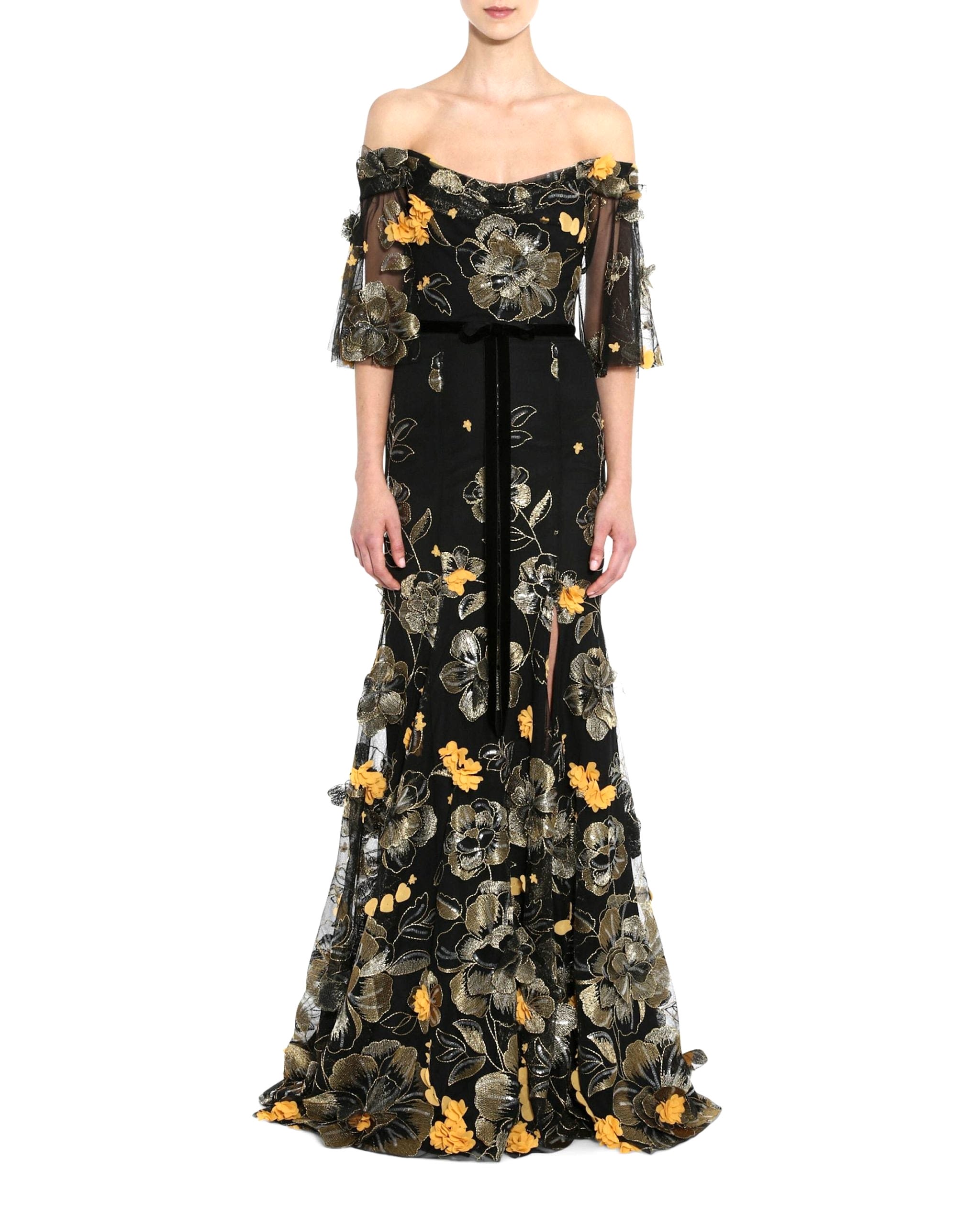 orange florals on a black dress is one of the most unique fall wedding ideas