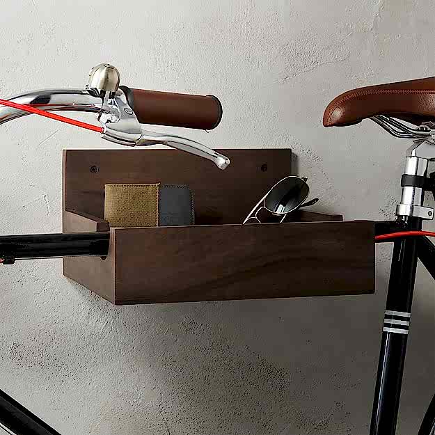 Wood open top box hanging on wall with slot to hang bicycle