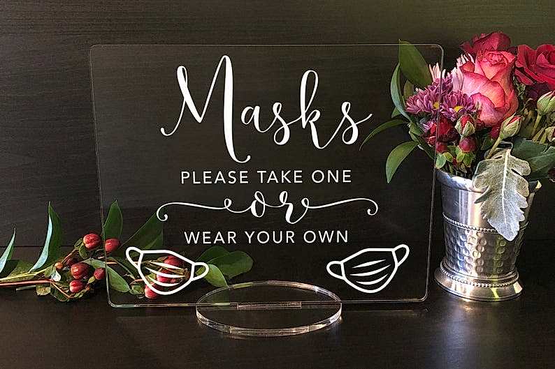 mask sign for wedding table