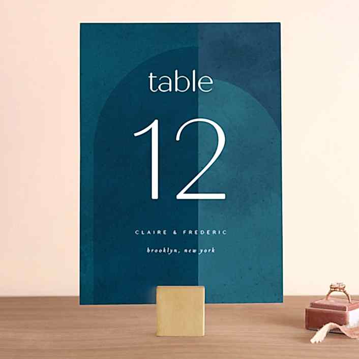 arched blue table numbers are unique 2020 fall wedding ideas