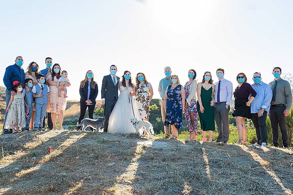 portrait of masked wedding guests