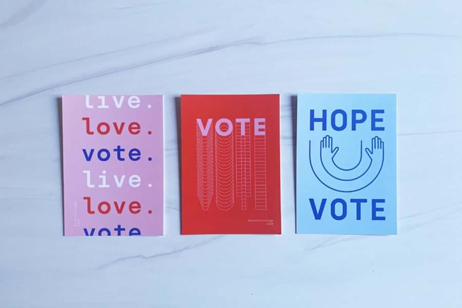 Three "vote" postcards