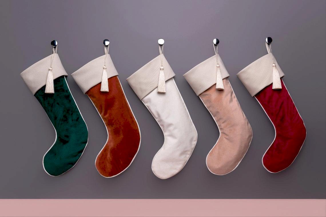 assorted stockings hanging on wall