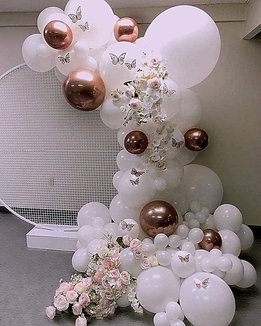 white and rose gold balloons