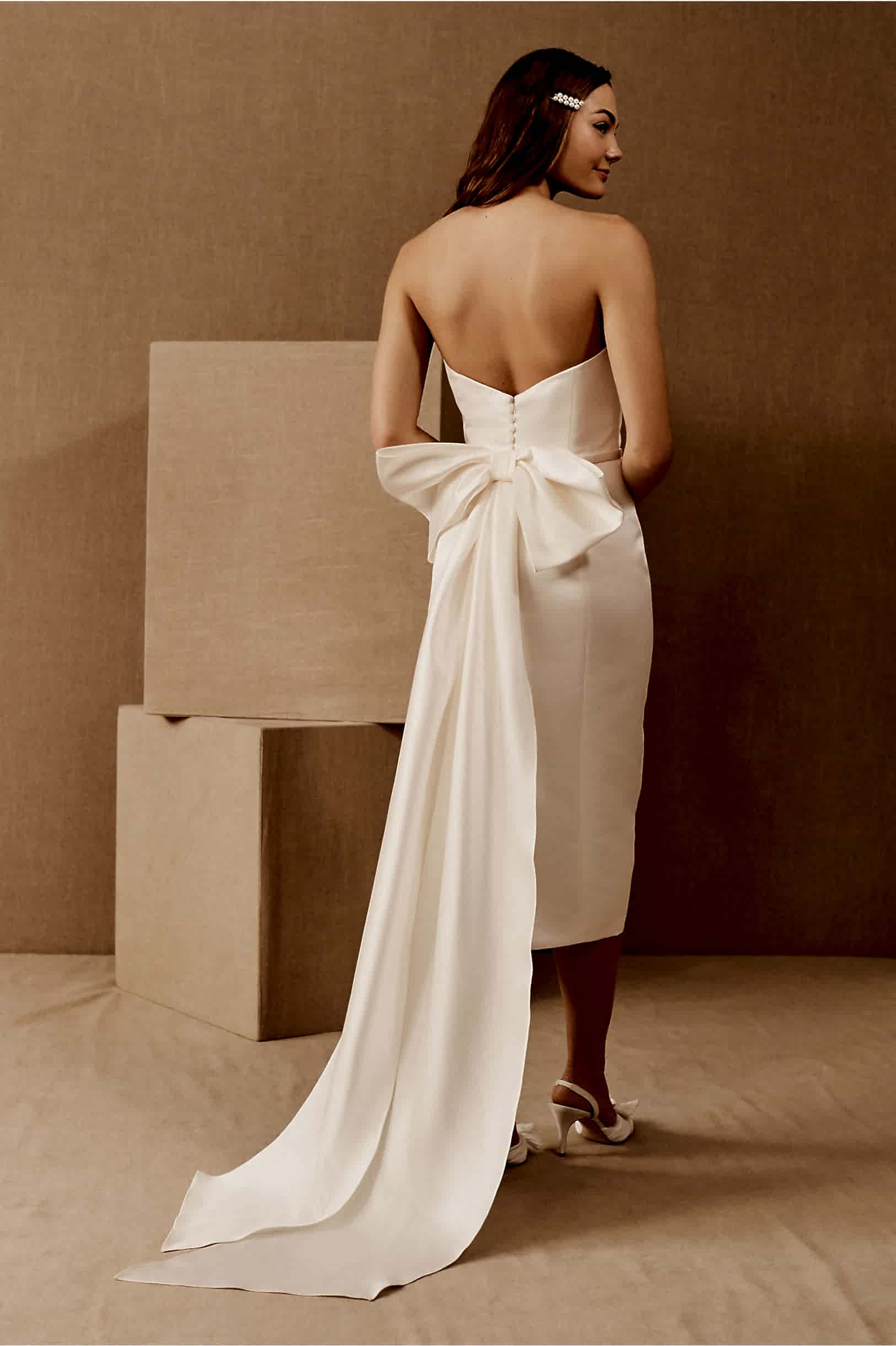 tea length dress with statement bow
