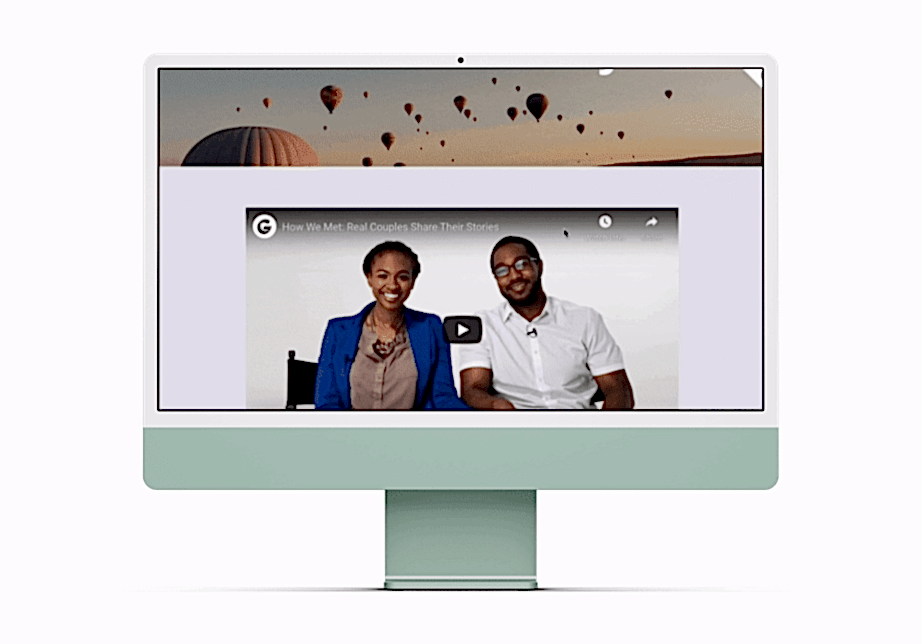 Computer screen showing moving image of a wedding website