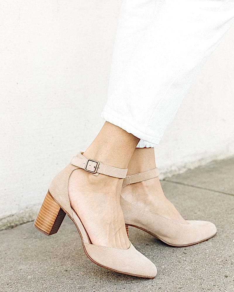 woman wearing nude colored block heels