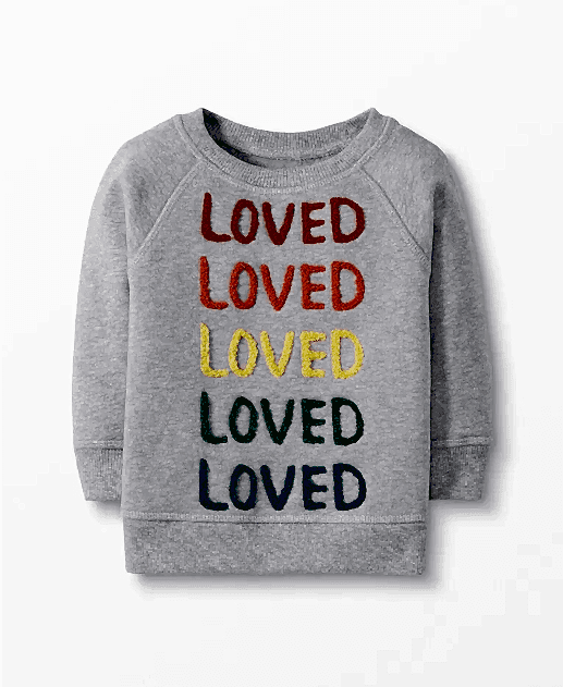 Grey kids sweatshirt with the word "loved" in red, orange, yellow, green, and blue